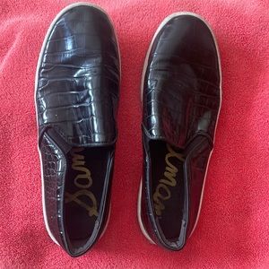 Black Sam Eldeman Slip-ons with snake skin pattern
